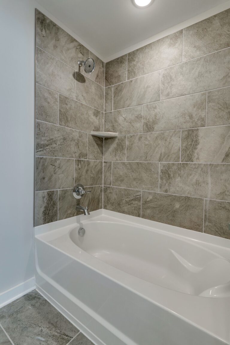 Owner's Bath with Soaker Tub, Tile Surround and Flooring